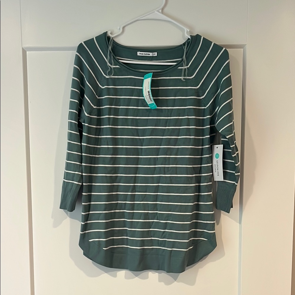 Pink Clover Quarter Sleeve Top in a Beautiful Sage Green Color W/ a Rounded Hem